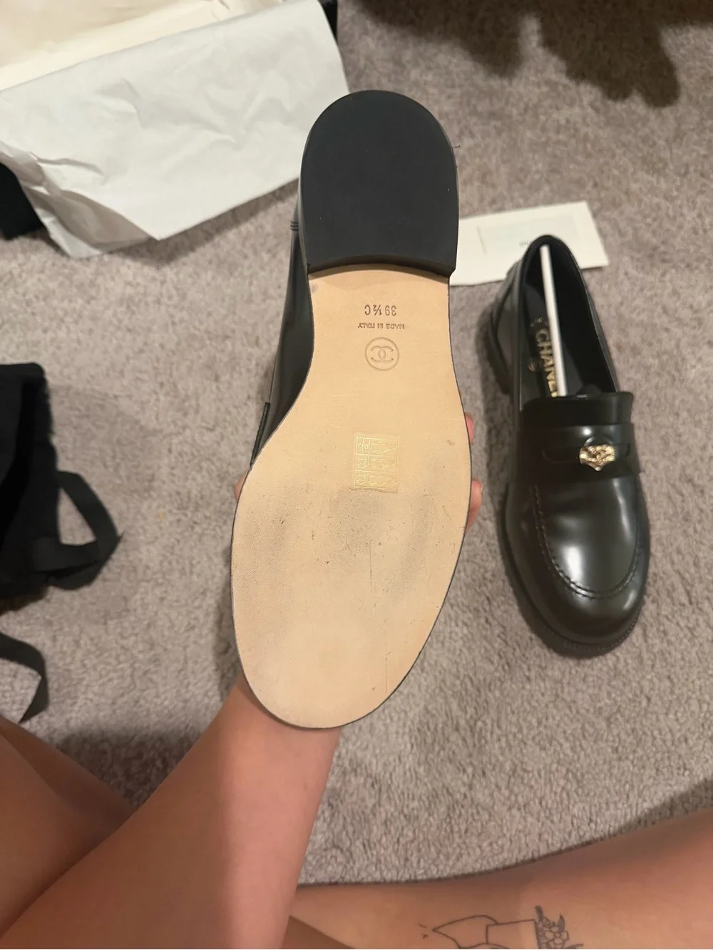 CHANEL Black Leather Loafers with Gold Heart Accent